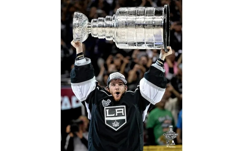 Jonathan Quick Los Angeles Kings Unsigned 2014 Stanley Cup Champions Raising Cup Photograph