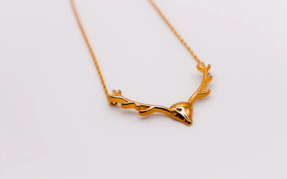 Golden Wilderness Antler Pendant