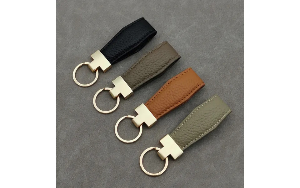 Top Layer Leather Car Keychain Fashion Genuine Leather Key Chain Ring Alloy Pendant Creative Men And Women Leather Lanya